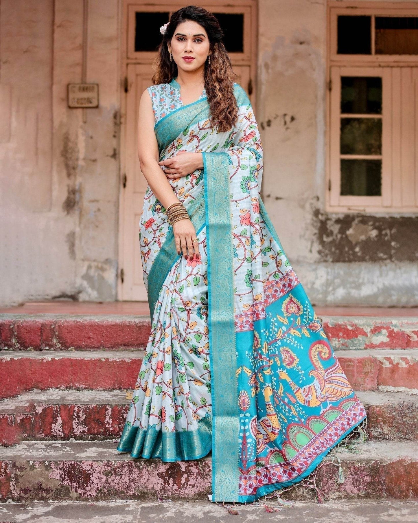 Sky Blue Tussar Silk Saree with Multicolor Floral Design and Zari Paisley Border - SEEANS
