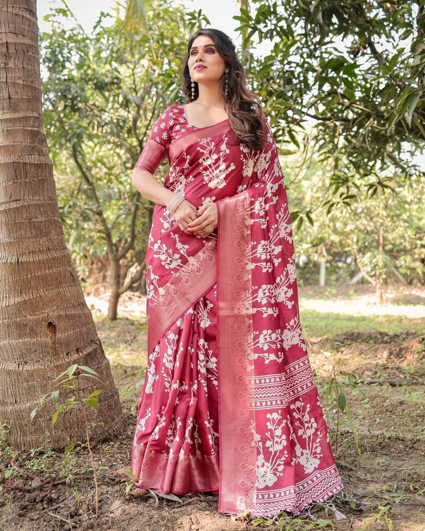 Maroon Tussar Silk Saree with White Floral Motifs, Intricate Zari Border, and Elegant Tassel Pallu - SEEANS