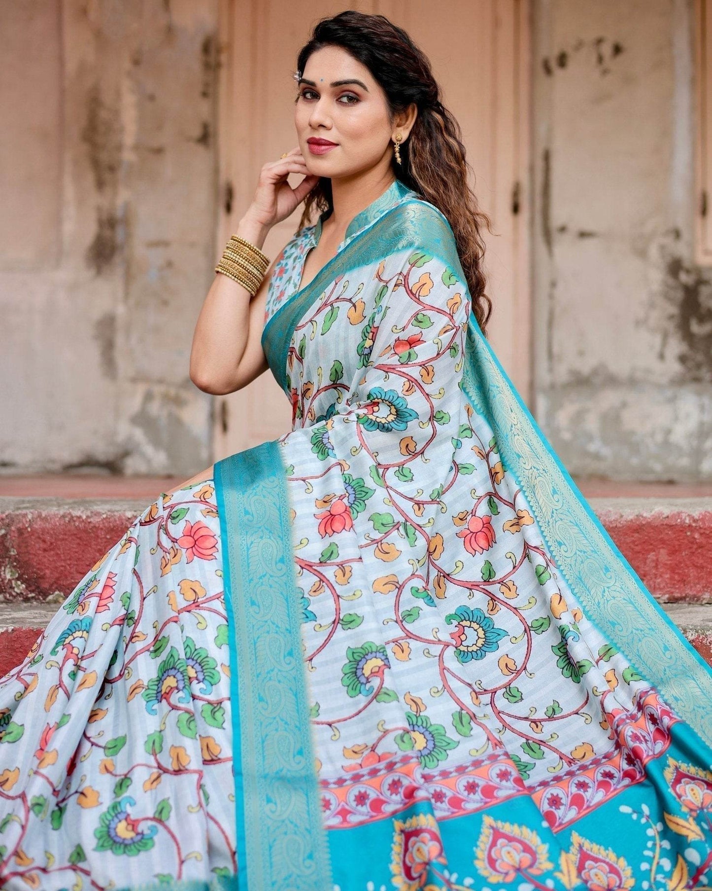 Sky Blue Tussar Silk Saree with Multicolor Floral Design and Zari Paisley Border - SEEANS