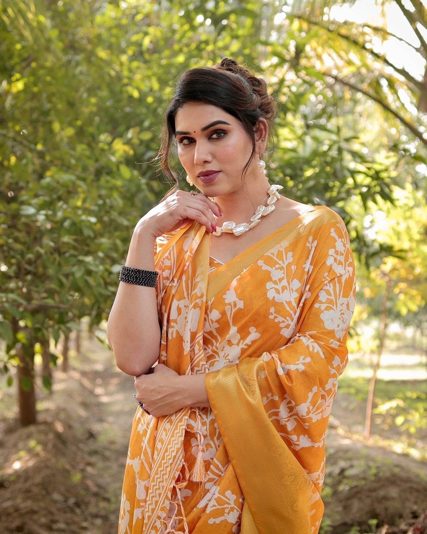 Sunshine Yellow Tussar Silk Saree with White Floral Motifs, Lustrous Zari Border, and Graceful Tassel Pallu - SEEANS