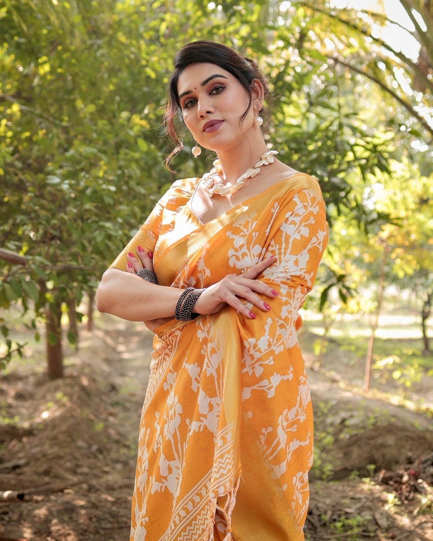 Sunshine Yellow Tussar Silk Saree with White Floral Motifs, Lustrous Zari Border, and Graceful Tassel Pallu - SEEANS
