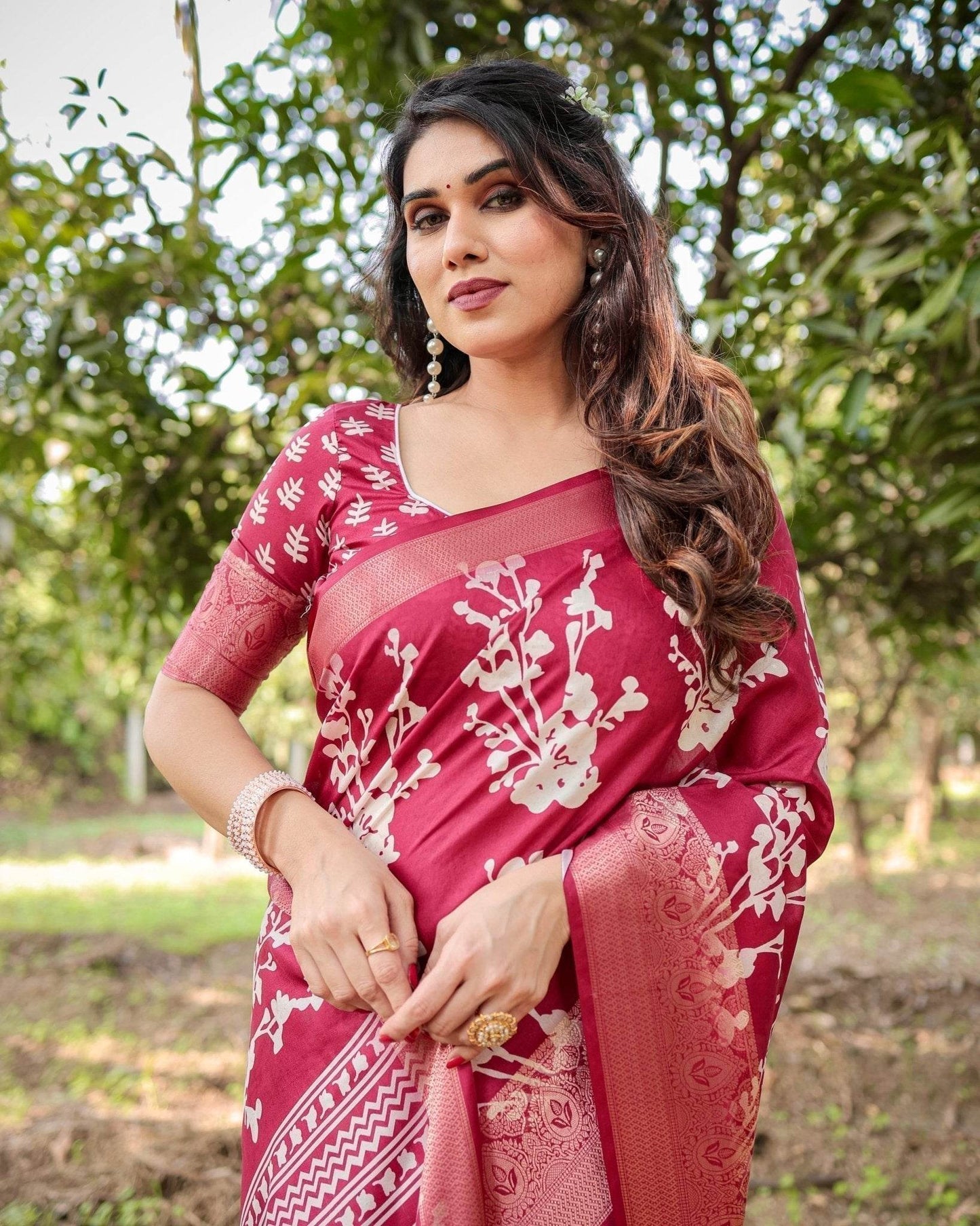 Maroon Tussar Silk Saree with White Floral Motifs, Intricate Zari Border, and Elegant Tassel Pallu - SEEANS