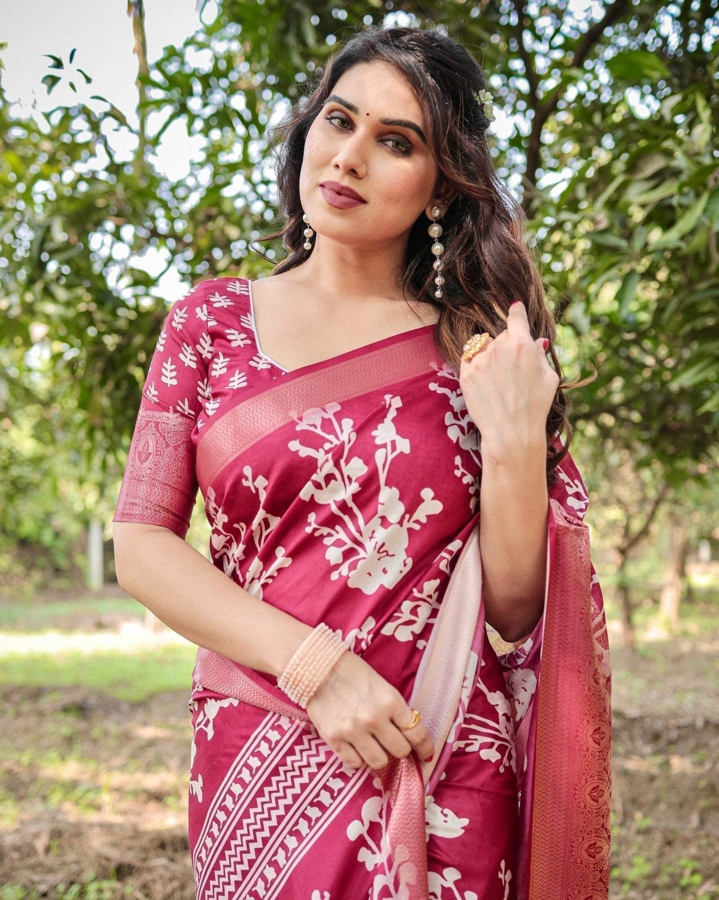 Maroon Tussar Silk Saree with White Floral Motifs, Intricate Zari Border, and Elegant Tassel Pallu - SEEANS