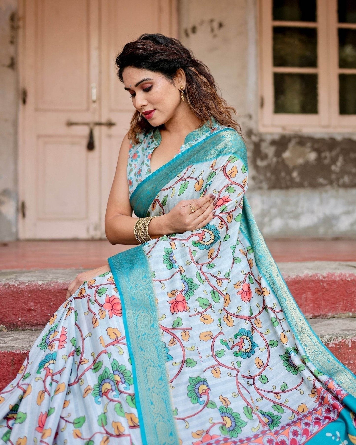 Sky Blue Tussar Silk Saree with Multicolor Floral Design and Zari Paisley Border - SEEANS