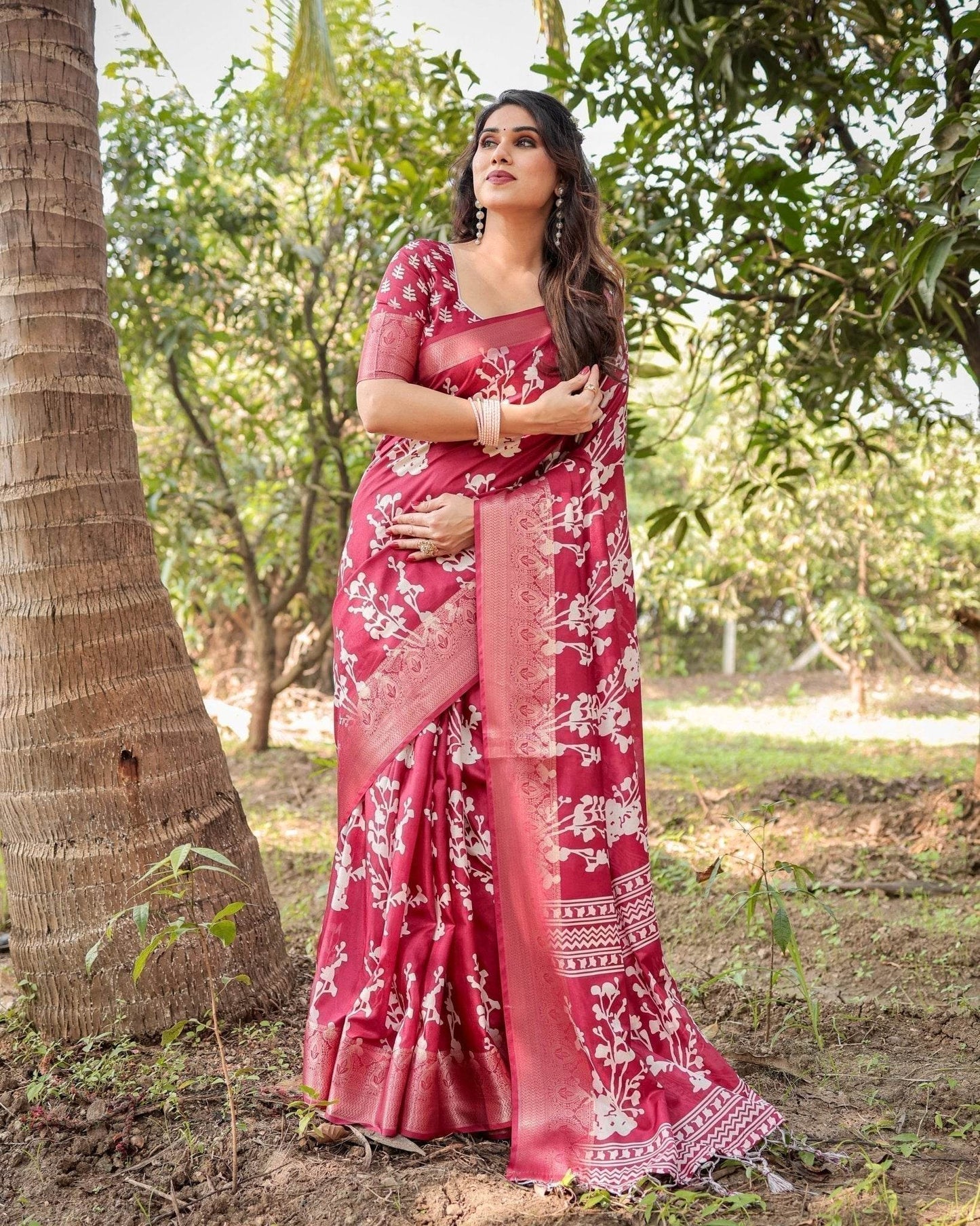 Maroon Tussar Silk Saree with White Floral Motifs, Intricate Zari Border, and Elegant Tassel Pallu - SEEANS