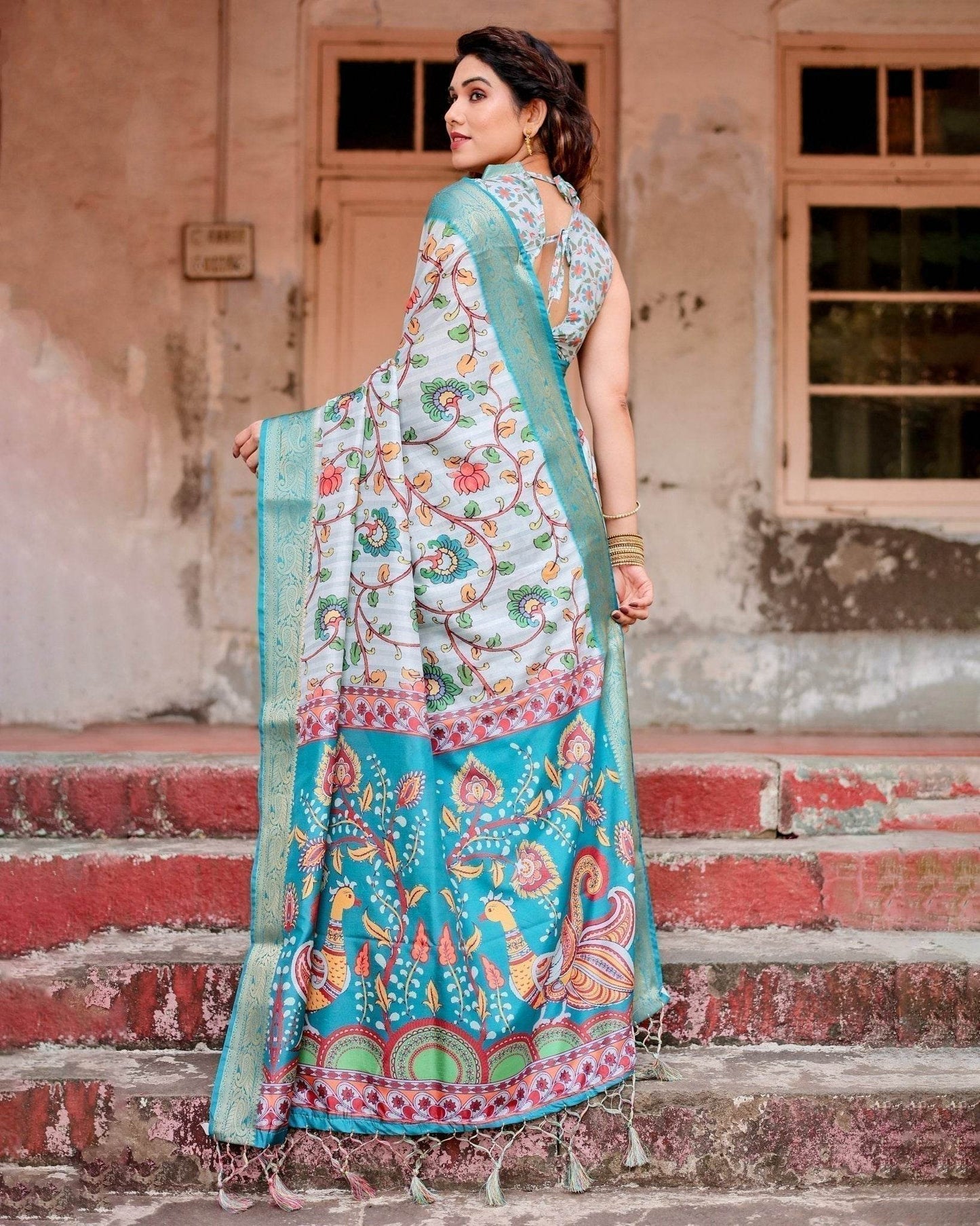 Sky Blue Tussar Silk Saree with Multicolor Floral Design and Zari Paisley Border - SEEANS