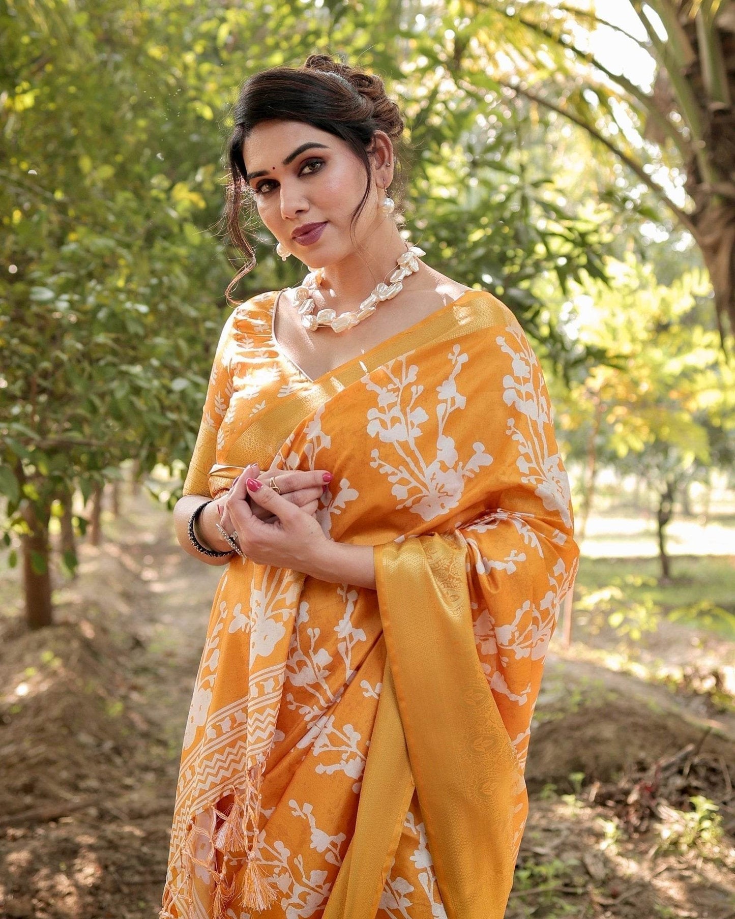 Sunshine Yellow Tussar Silk Saree with White Floral Motifs, Lustrous Zari Border, and Graceful Tassel Pallu - SEEANS