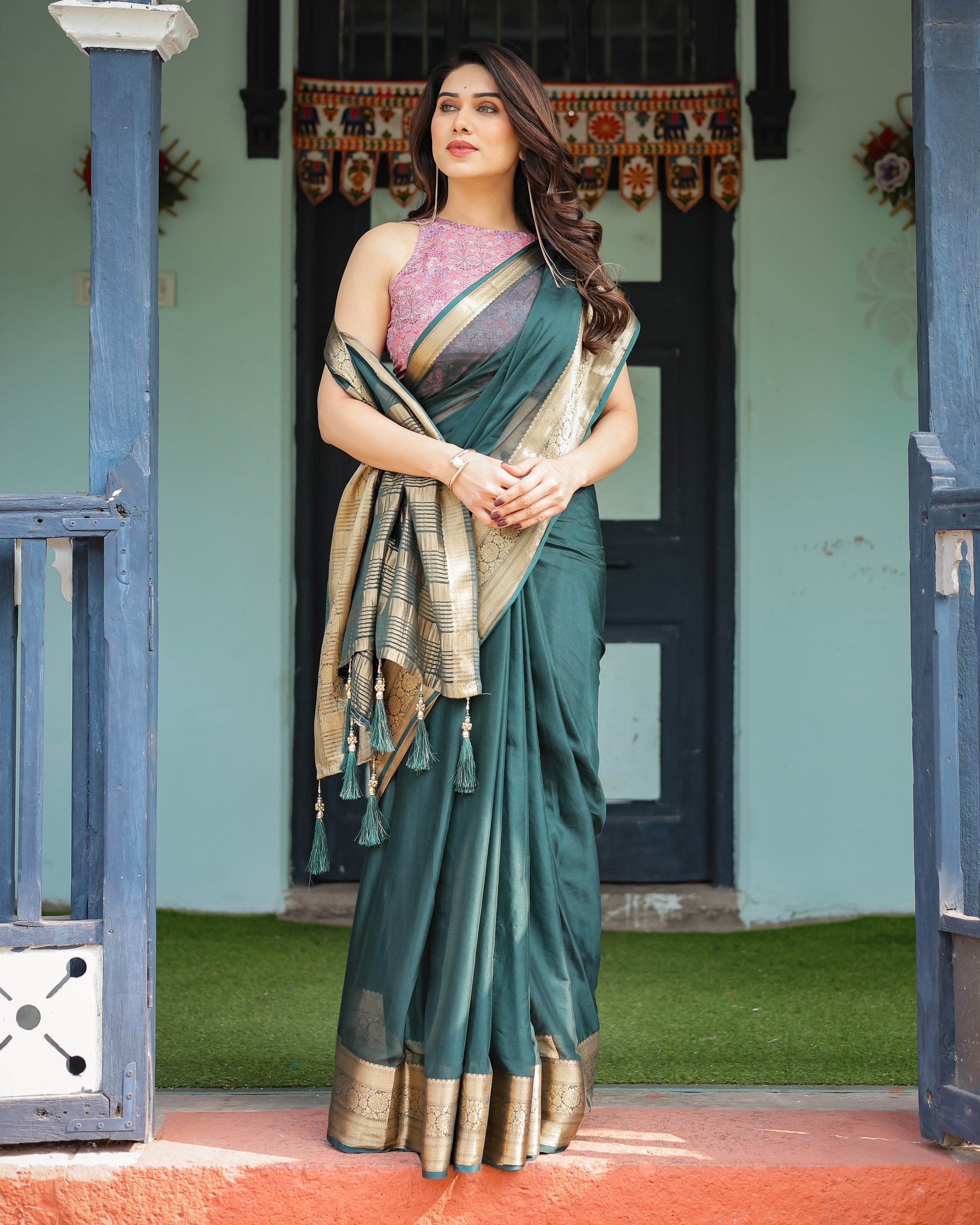 Enchanting Forest Green Plain Chiffon Saree with Gold Zari Border, Floral Printed Blouse & Tassel Details - SEEANS