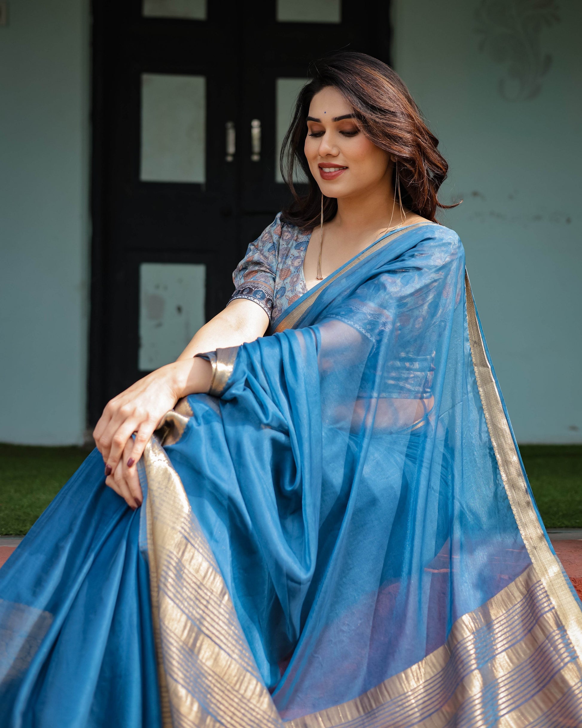 Vibrant Peacock Blue Plain Chiffon Saree with Gold Zari Border, Floral Printed Blouse & Tassel Accents - SEEANS