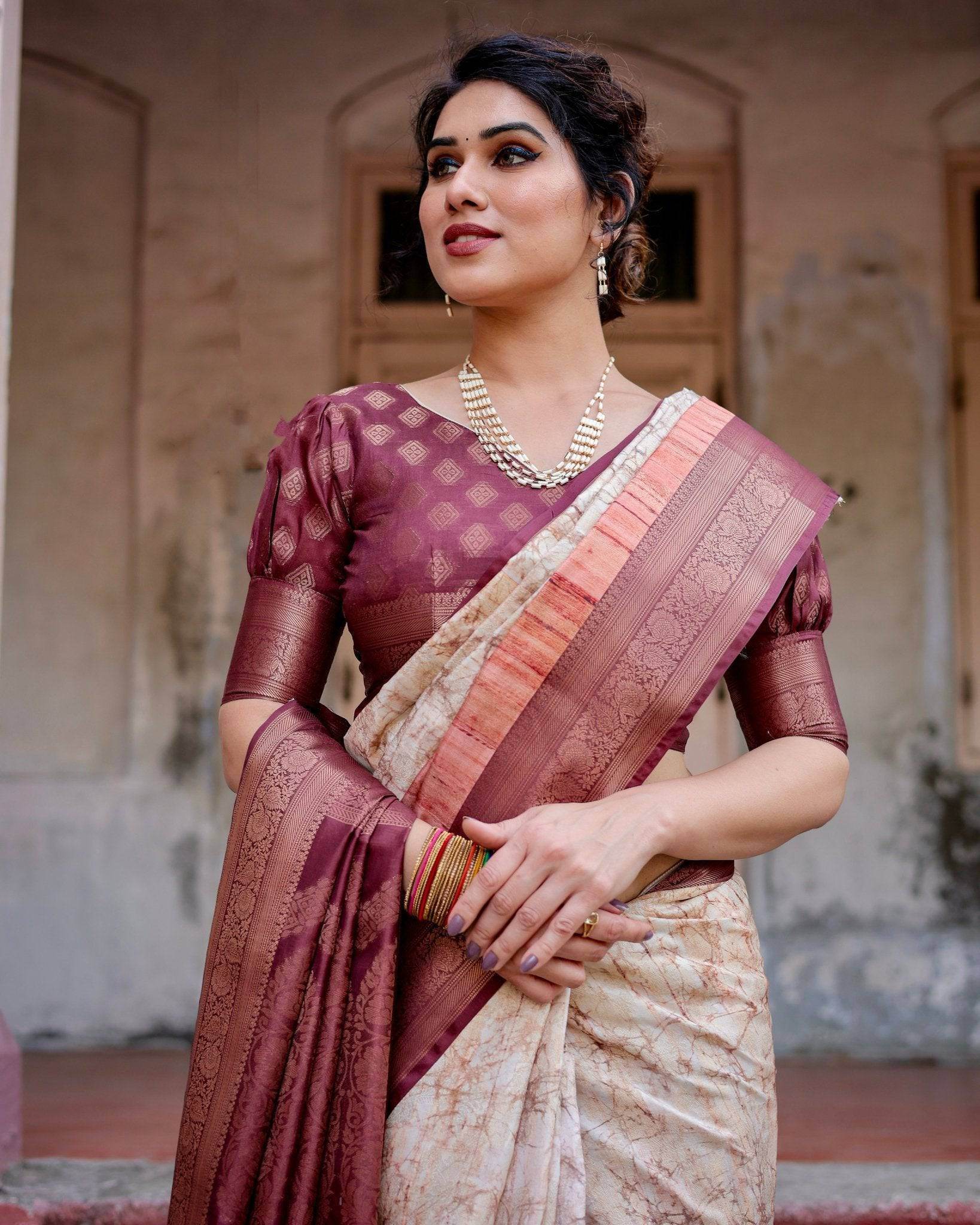 Marble-Print Banarasi Silk Saree in Deep Maroon with Zari Weaving and Tassels - SEEANS