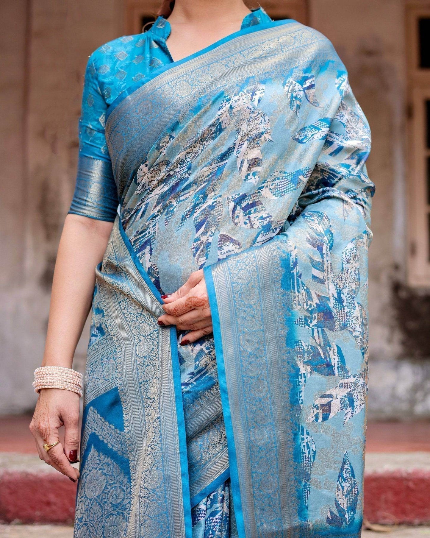 Aqua Blue Banarasi Silk Saree with Zari Border, Floral Motifs, and Tassels - SEEANS