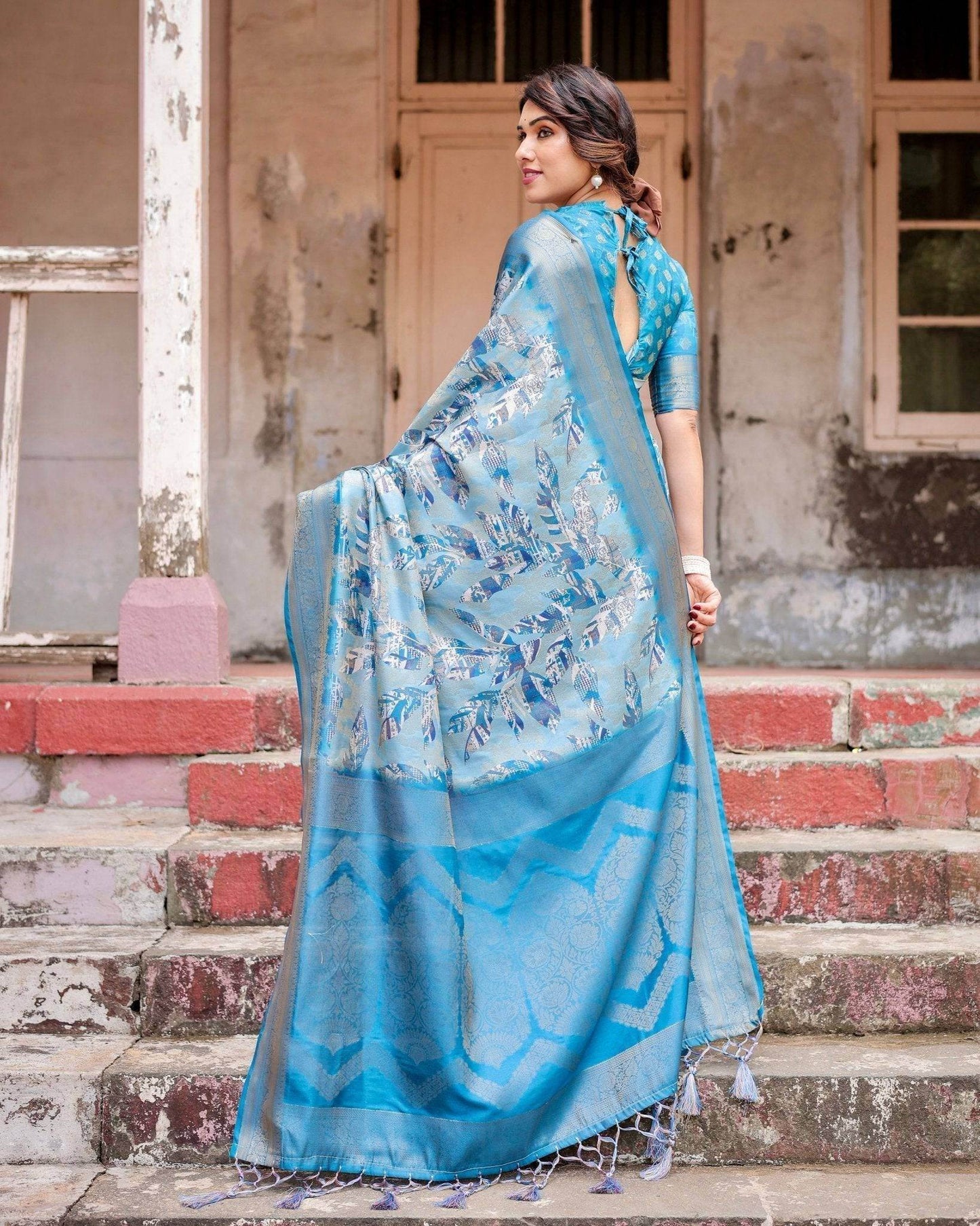 Aqua Blue Banarasi Silk Saree with Zari Border, Floral Motifs, and Tassels - SEEANS