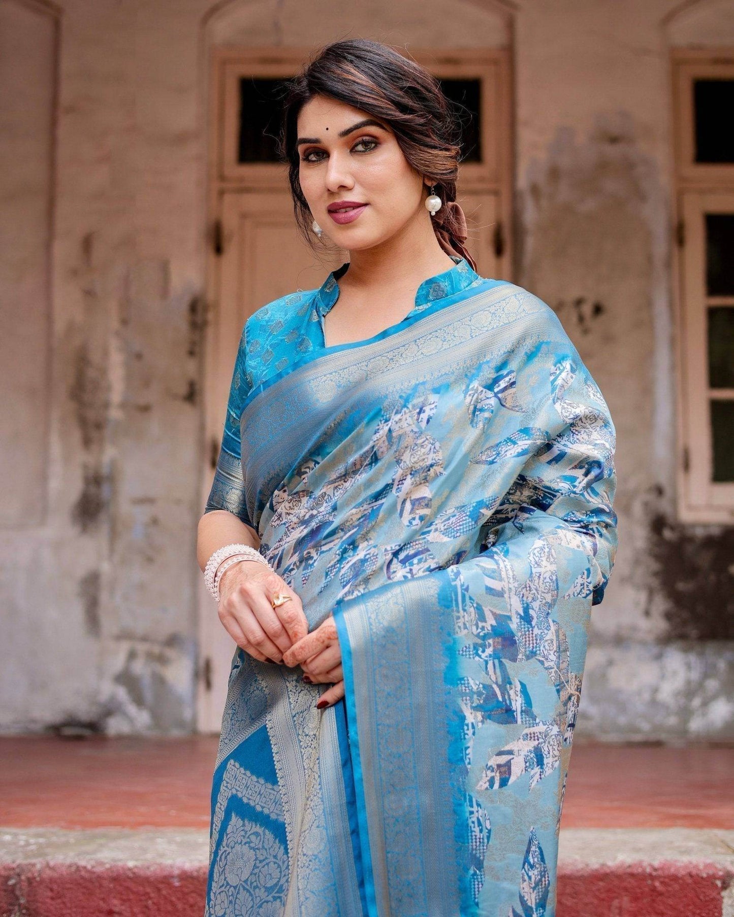 Aqua Blue Banarasi Silk Saree with Zari Border, Floral Motifs, and Tassels - SEEANS