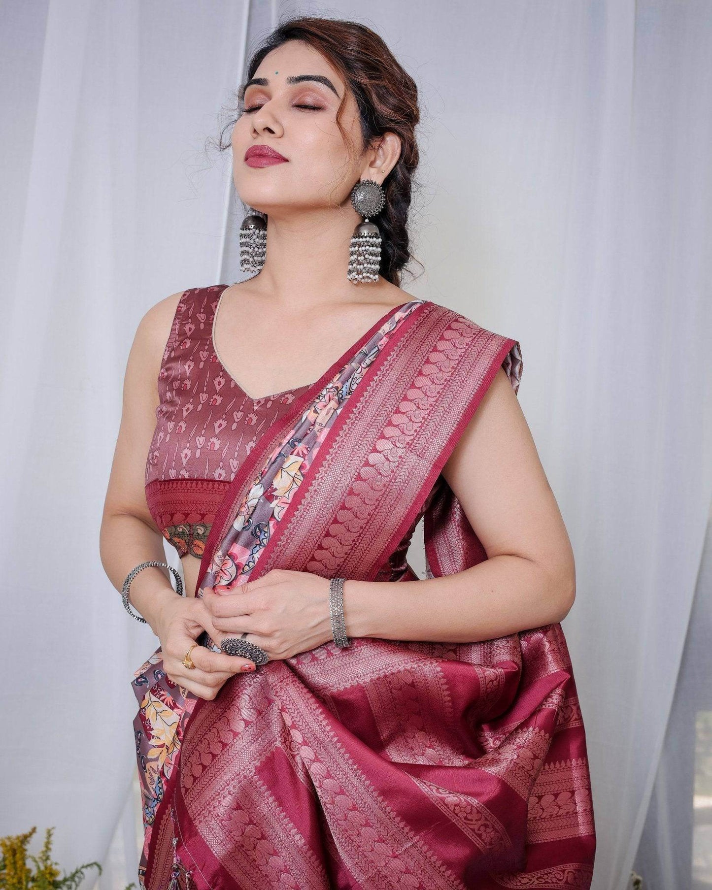 Luxurious Maroon Banarasi Silk Saree with Paisley Print and Tassels - SEEANS