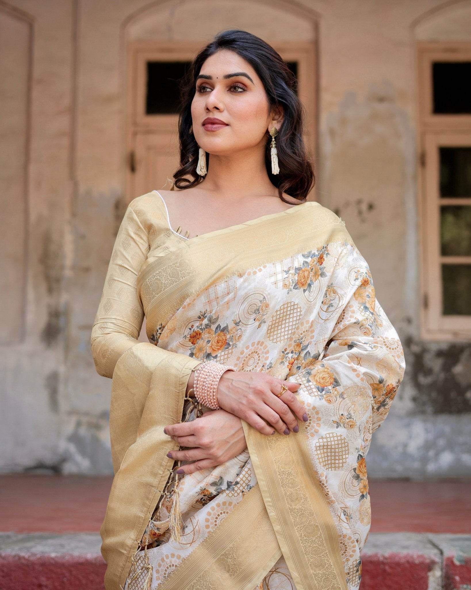 Ivory and Gold Banarasi Silk Saree with Floral Print, Zari Border, and Tassels - SEEANS