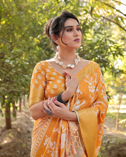 Sunshine Yellow Tussar Silk Saree with White Floral Motifs, Lustrous Zari Border, and Graceful Tassel Pallu - SEEANS