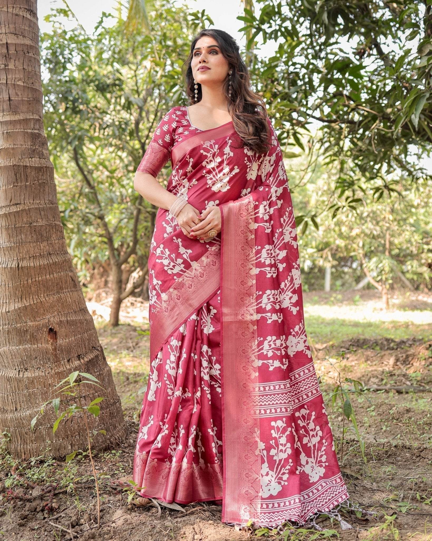 Maroon Tussar Silk Saree with White Floral Motifs, Intricate Zari Border, and Elegant Tassel Pallu - SEEANS