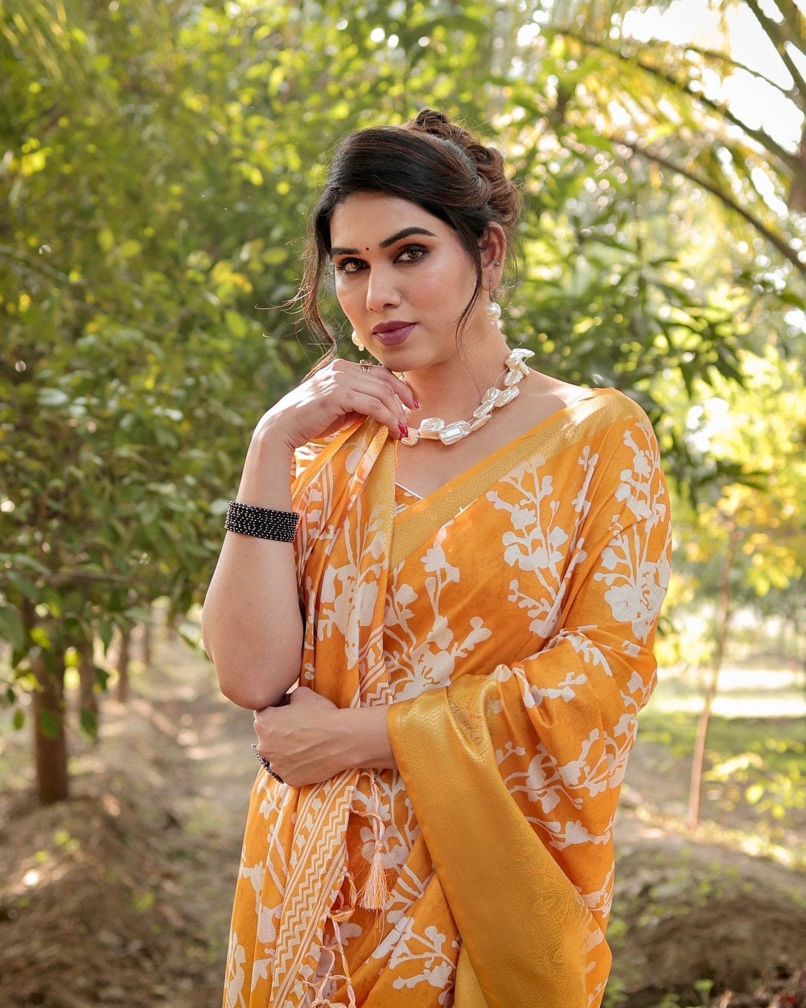 Sunshine Yellow Tussar Silk Saree with White Floral Motifs, Lustrous Zari Border, and Graceful Tassel Pallu - SEEANS