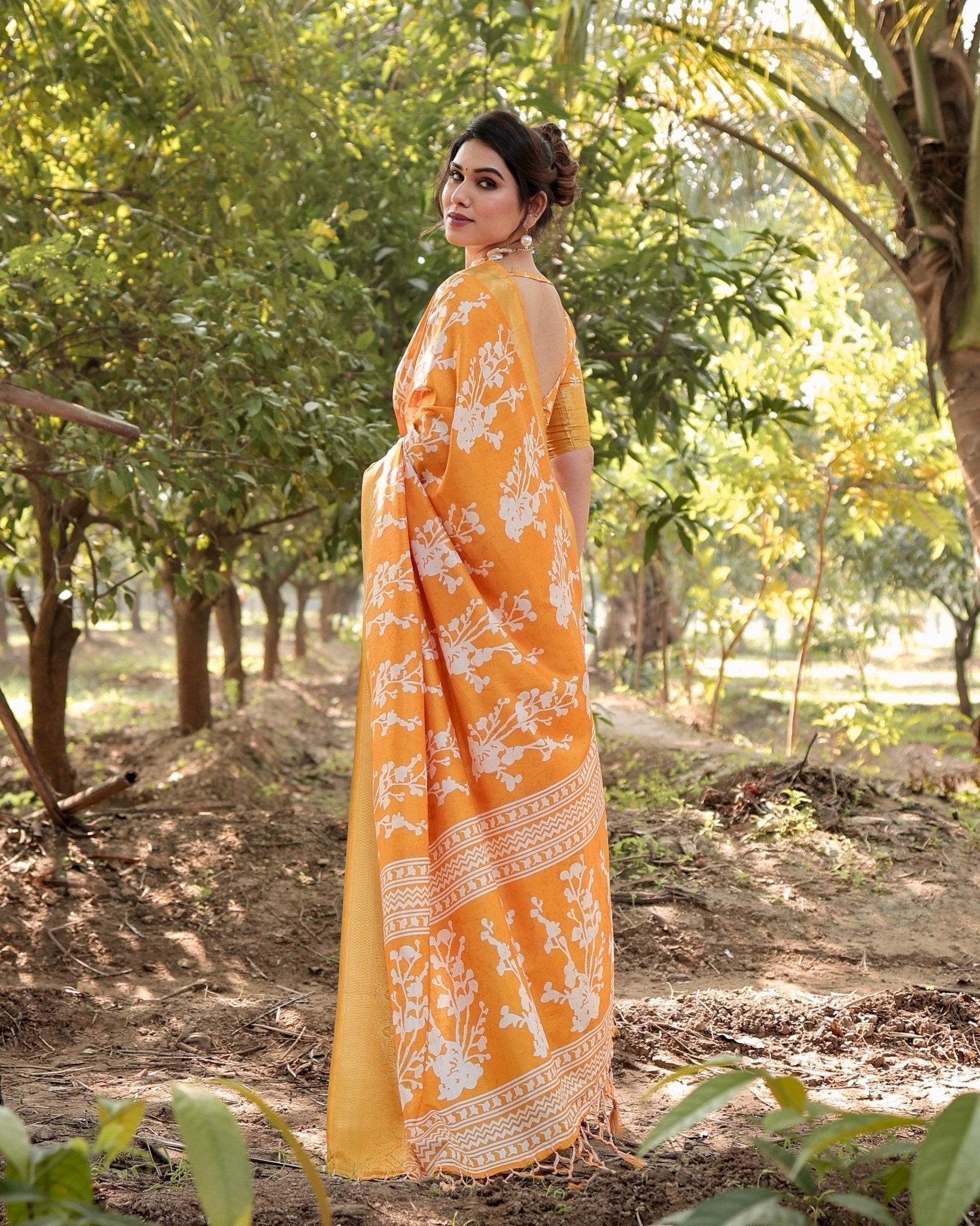 Sunshine Yellow Tussar Silk Saree with White Floral Motifs, Lustrous Zari Border, and Graceful Tassel Pallu - SEEANS