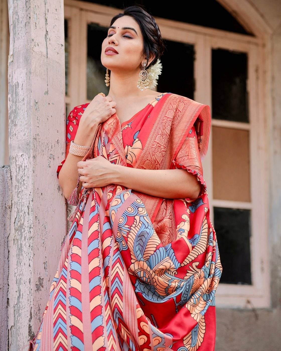 Vibrant Red Tussar Silk Saree with Bold Floral Motifs and Chevron Patterned Pallu - SEEANS