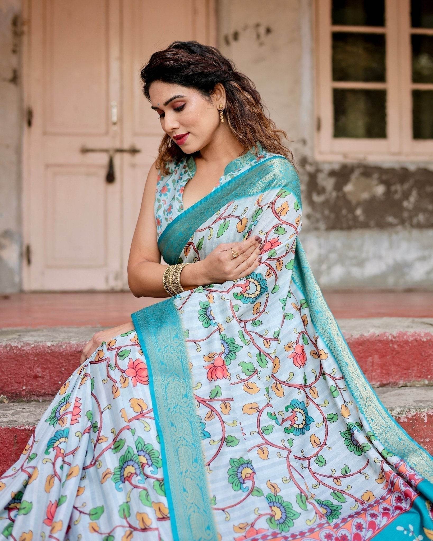 Sky Blue Tussar Silk Saree with Multicolor Floral Design and Zari Paisley Border - SEEANS