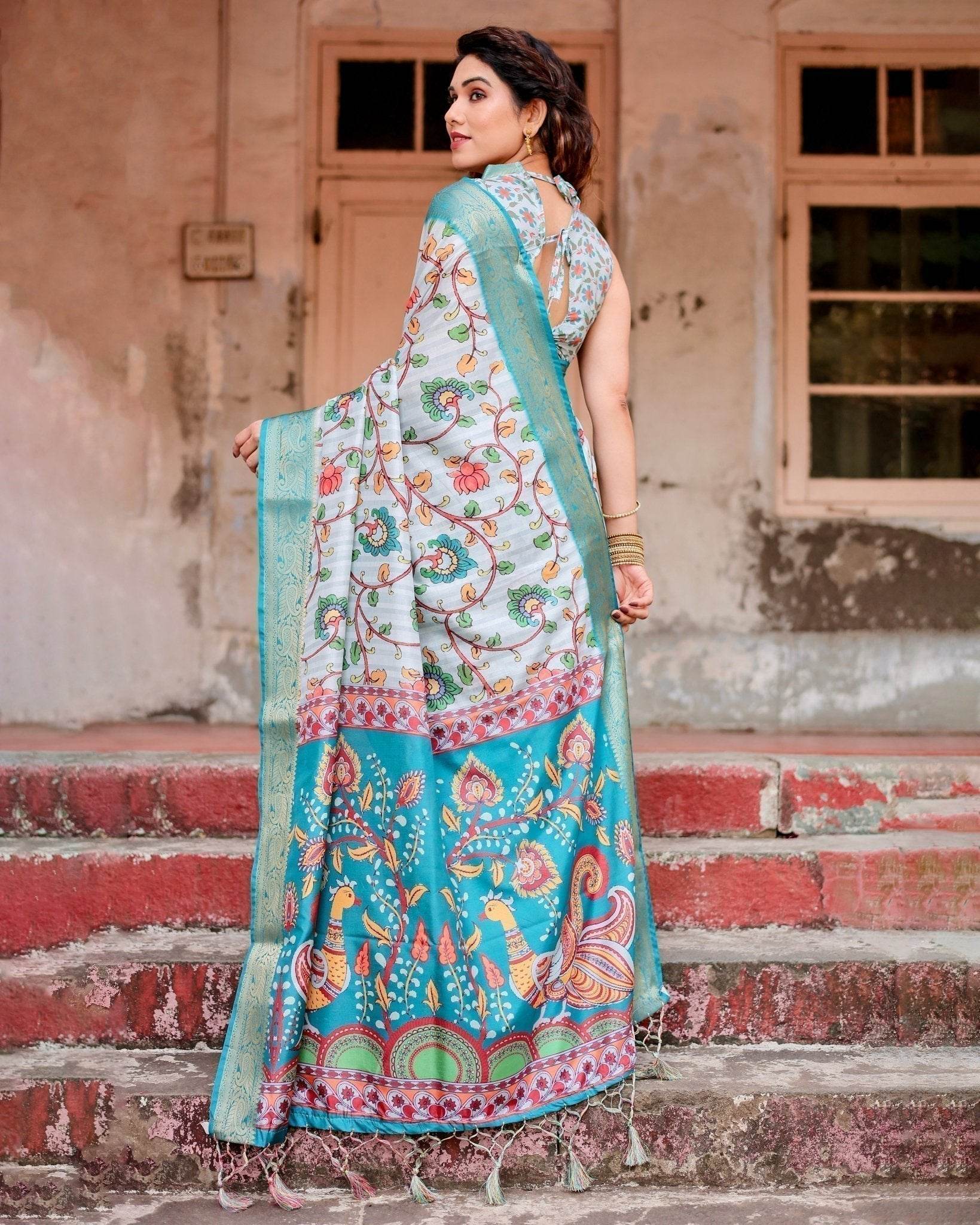 Sky Blue Tussar Silk Saree with Multicolor Floral Design and Zari Paisley Border - SEEANS