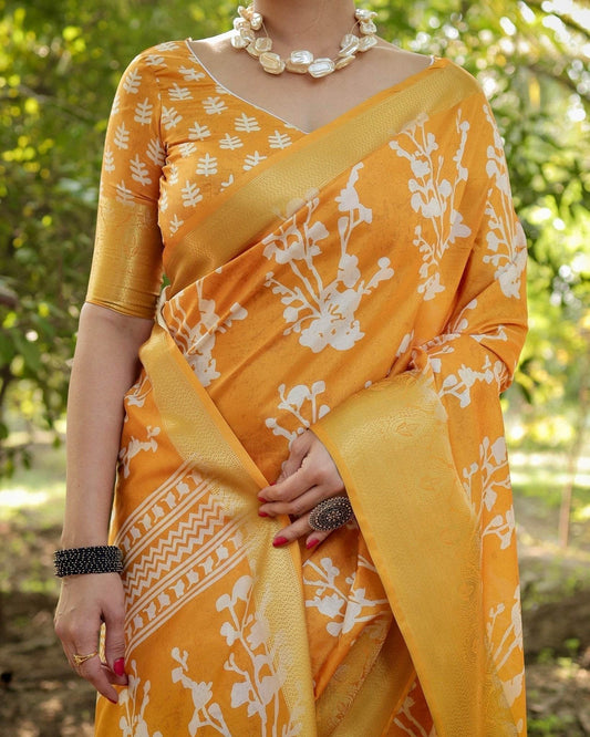 Sunshine Yellow Tussar Silk Saree with White Floral Motifs, Lustrous Zari Border, and Graceful Tassel Pallu - SEEANS