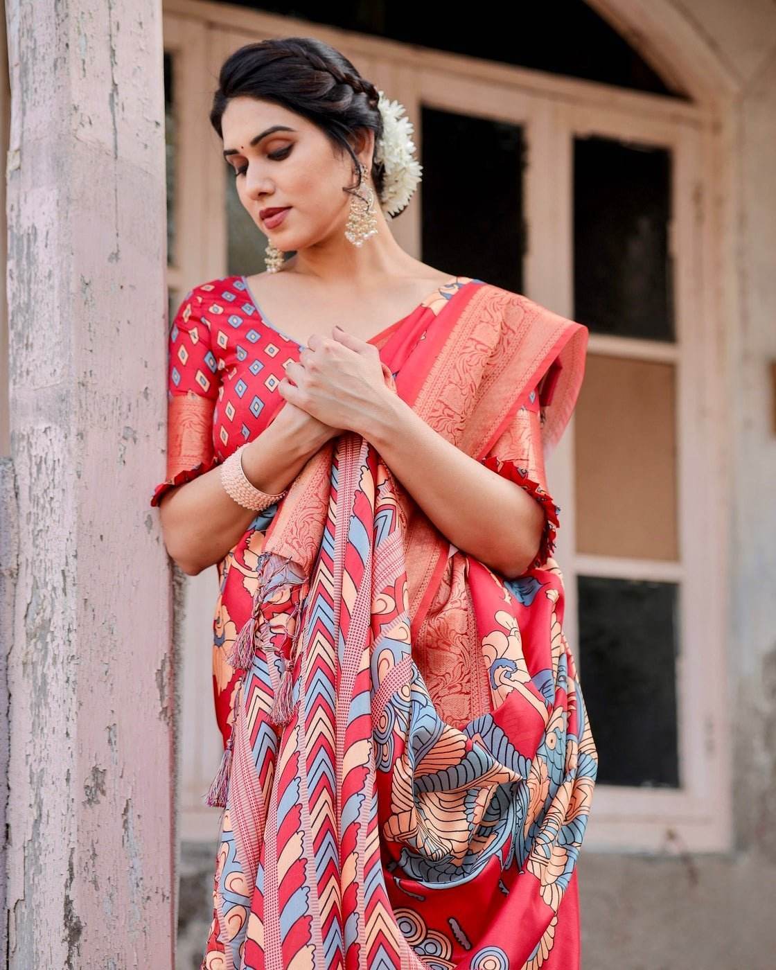 Vibrant Red Tussar Silk Saree with Bold Floral Motifs and Chevron Patterned Pallu - SEEANS